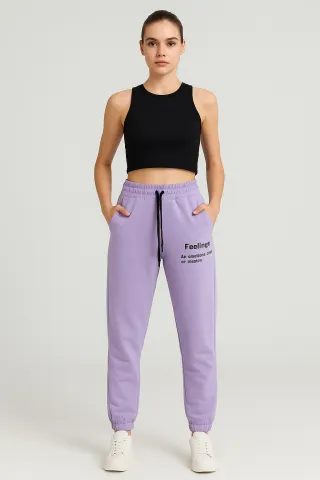Pantaloni de trening damă lila cu șiret și imprimeu "Feeling"