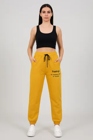 Pantaloni de trening damă mustar cu șiret și imprimeu "Feeling"