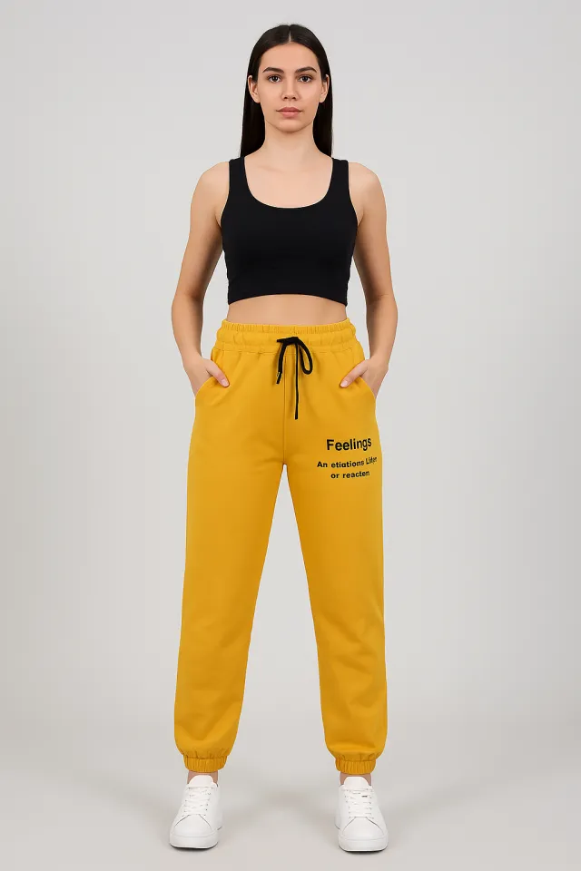 Pantaloni de trening damă mustar cu șiret și imprimeu "Feeling"
