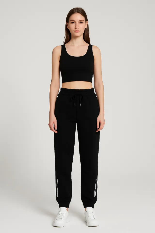 Pantaloni de trening damă negri cu dungi gri la glezne și buzunare cu fermoar